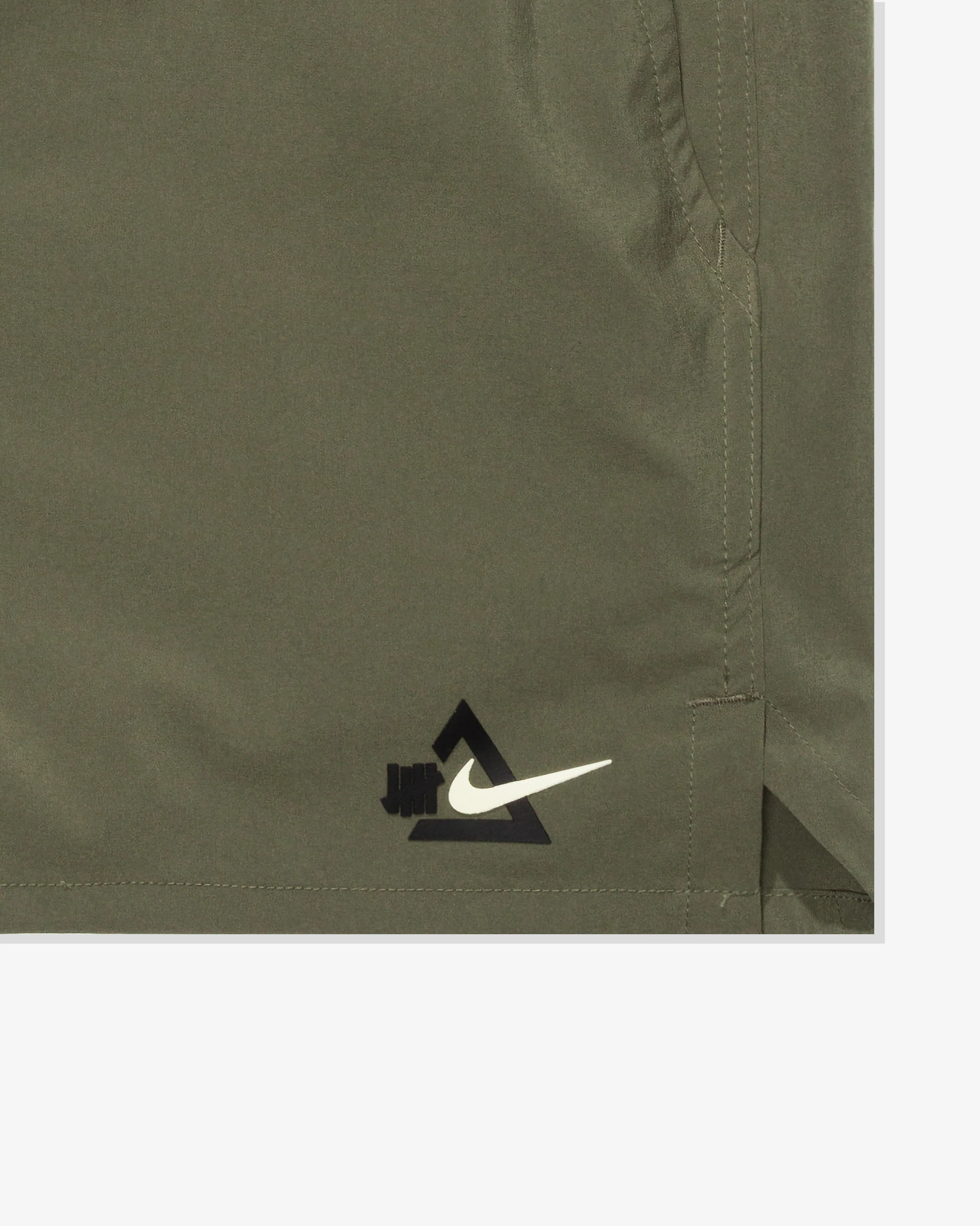 UACTP X NIKE NRG UNLMTD 5IN SHORT - MEDIUM OLIVE