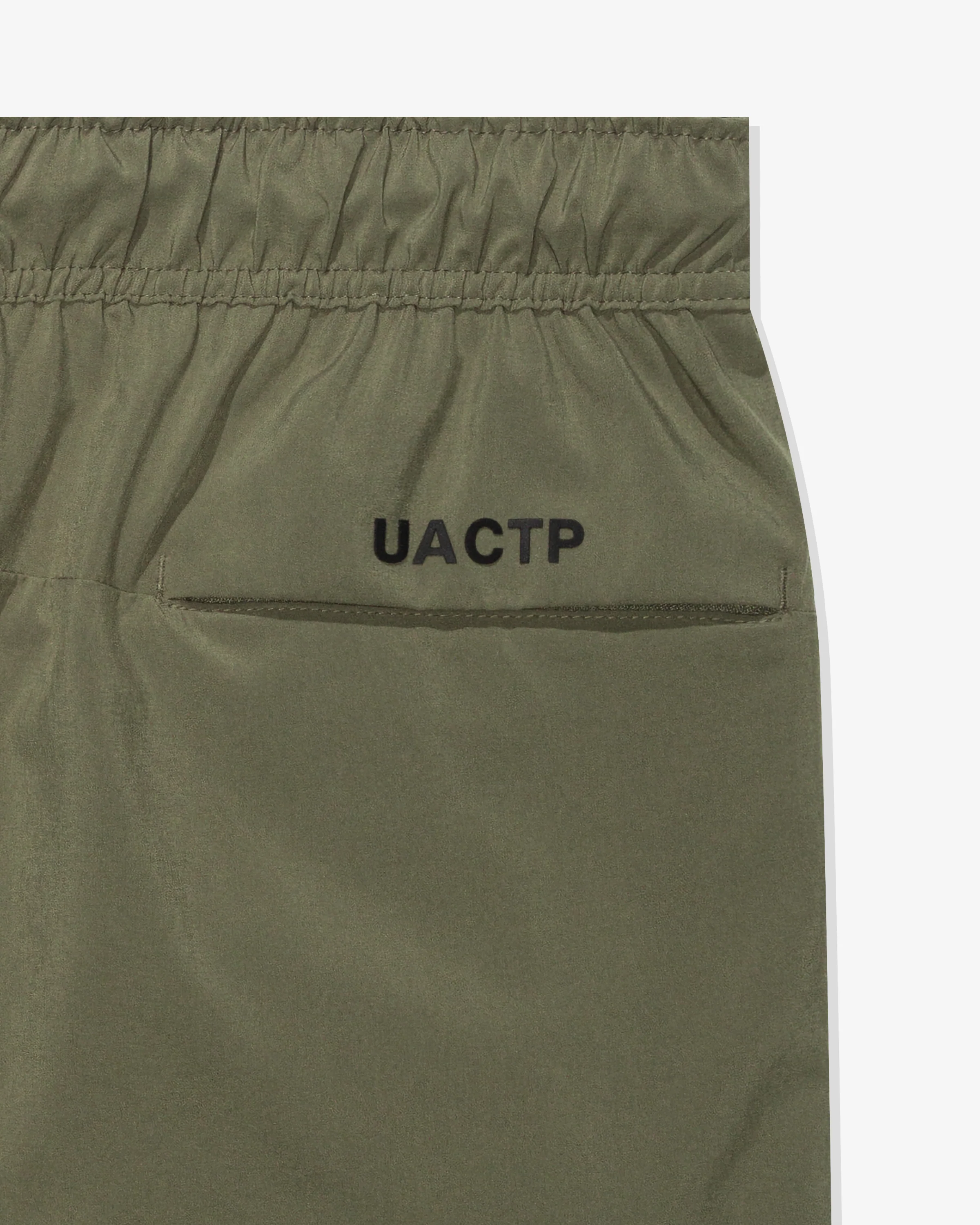 UACTP X NIKE NRG UNLMTD 5IN SHORT - MEDIUM OLIVE