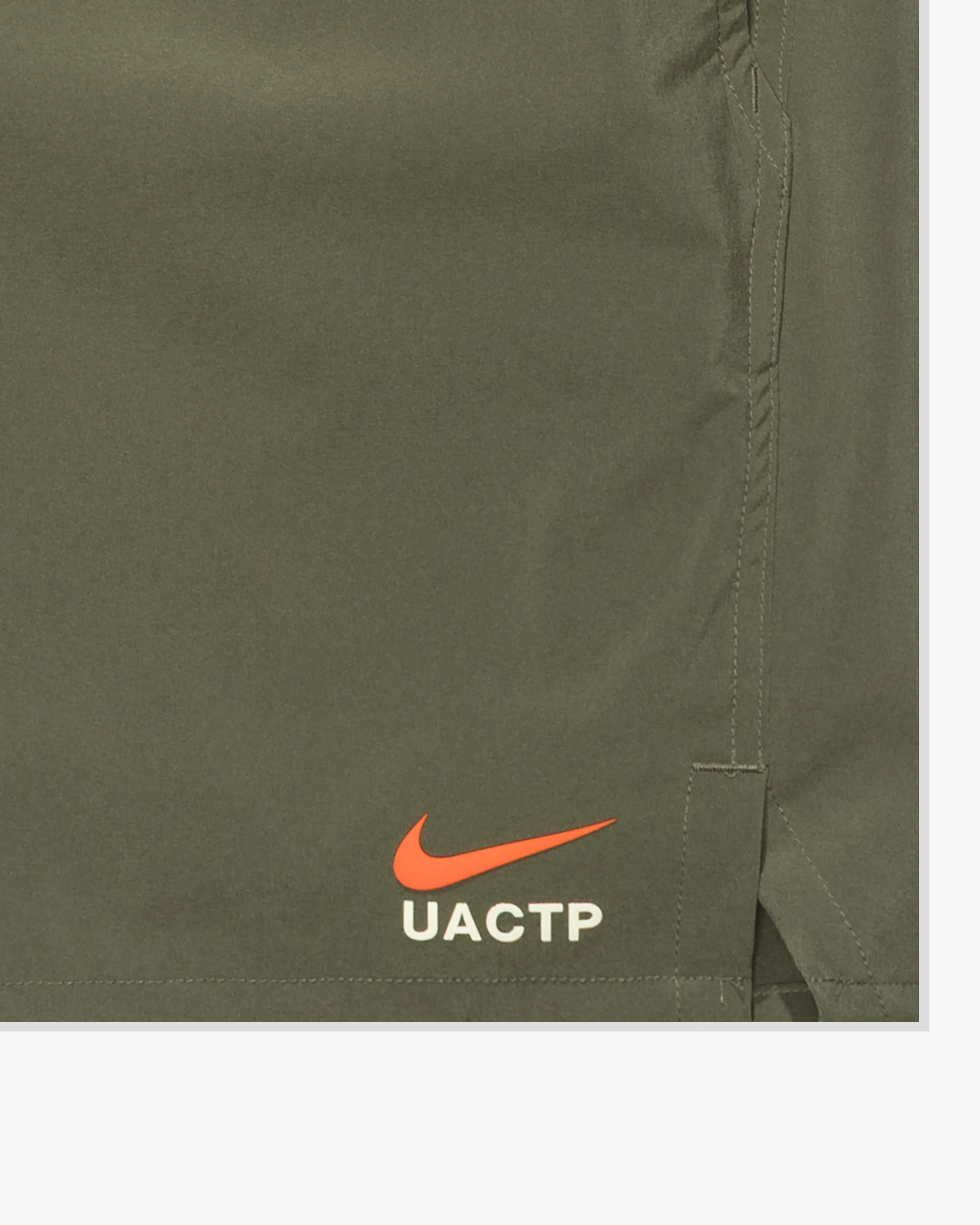 UACTP X NIKE NRG UNLMTD 7IN SHORT - MEDIUM OLIVE