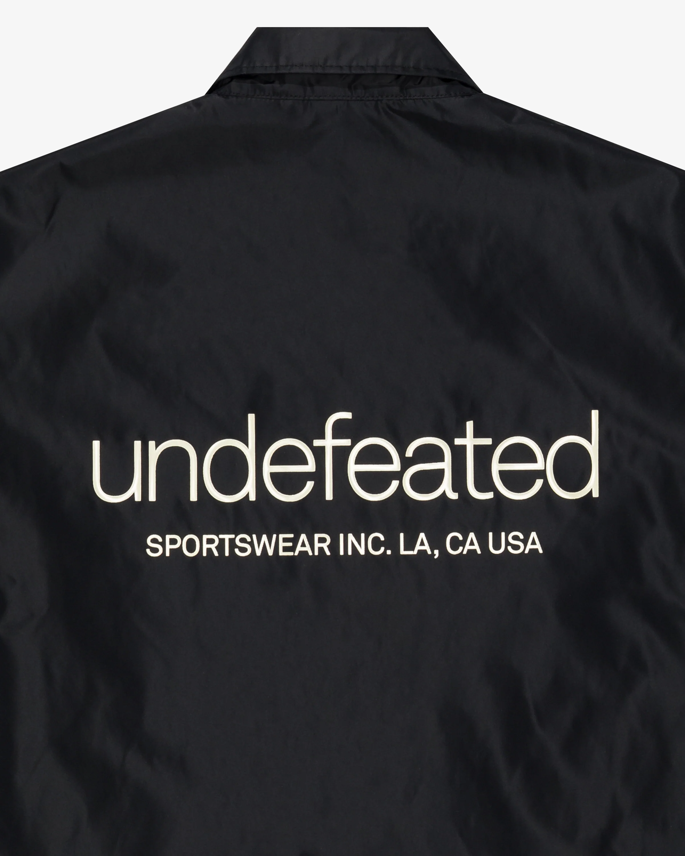UNDEFEATED INC. COACHES JACKET