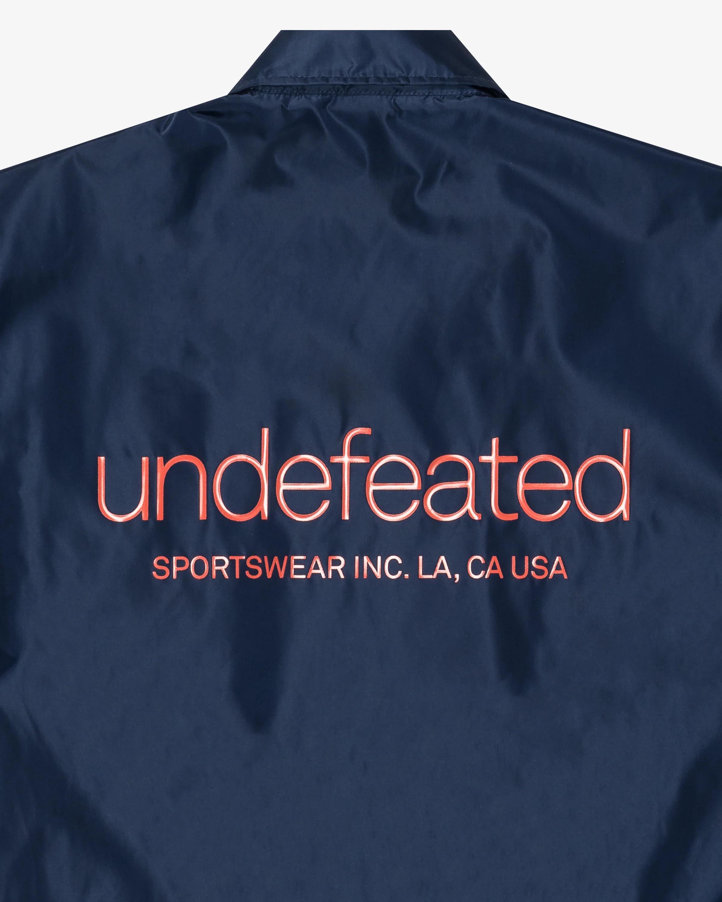 UNDEFEATED INC. COACHES JACKET