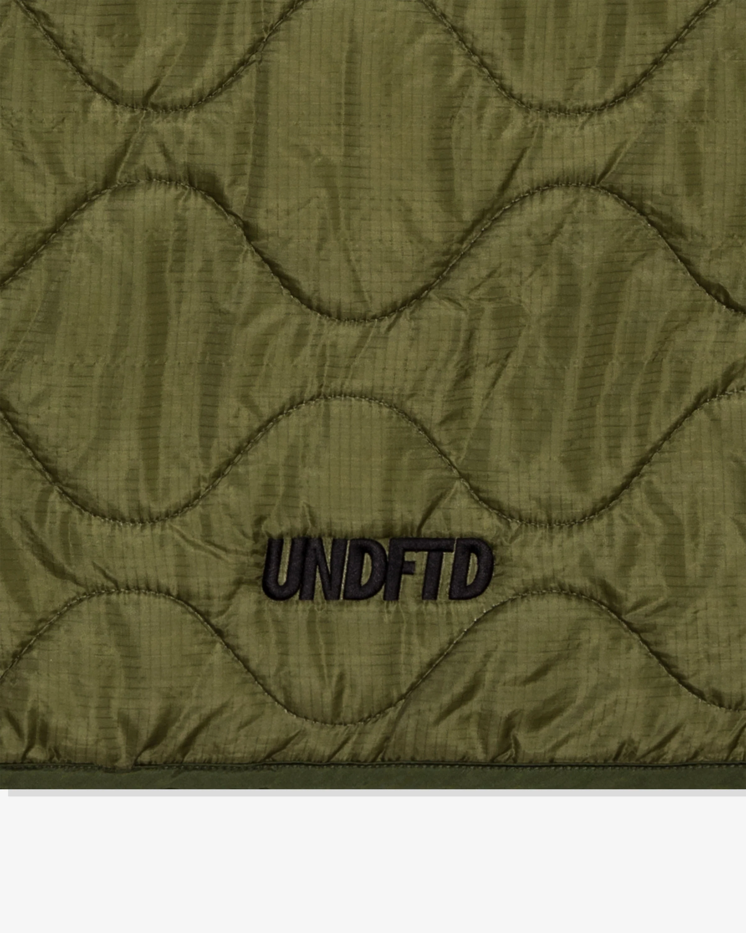 UNDEFEATED X OAMC PEACEMAKER LINER JACKET - OLIVE