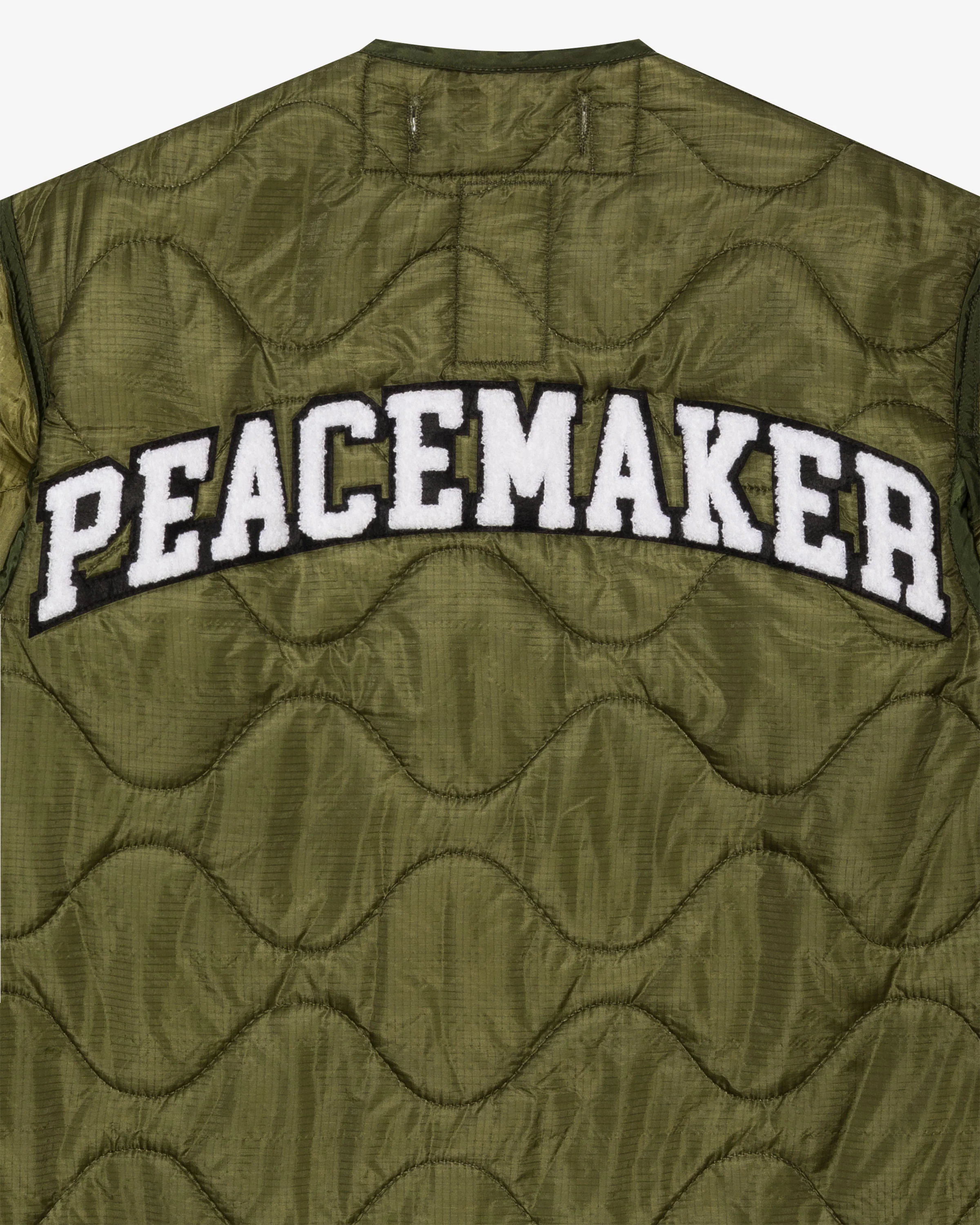 UNDEFEATED X OAMC PEACEMAKER LINER JACKET - OLIVE