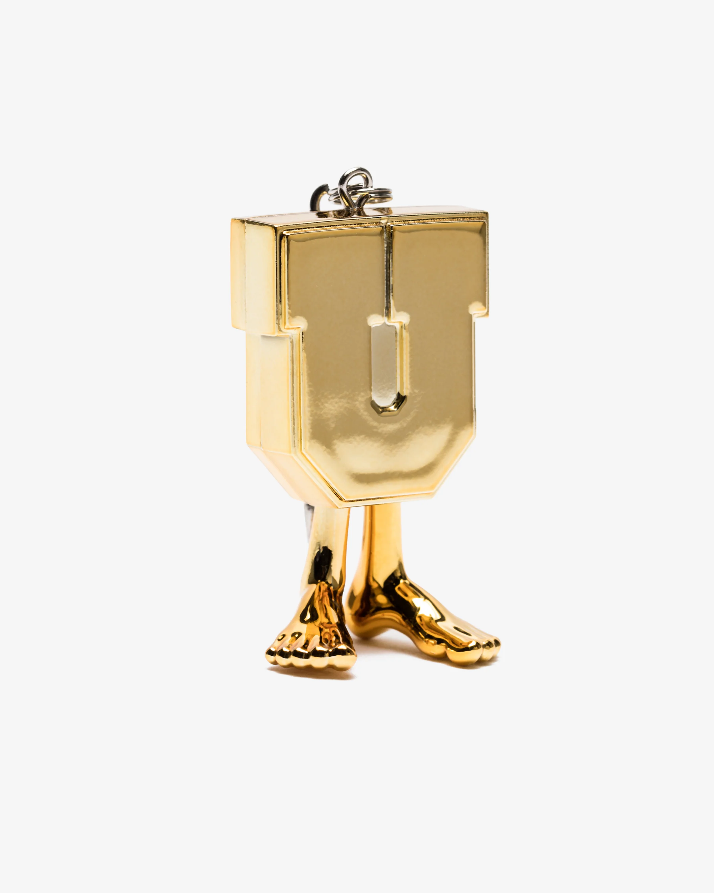 UNDEFEATED X MEDICOM UMAN KEYCHAIN - GOLD