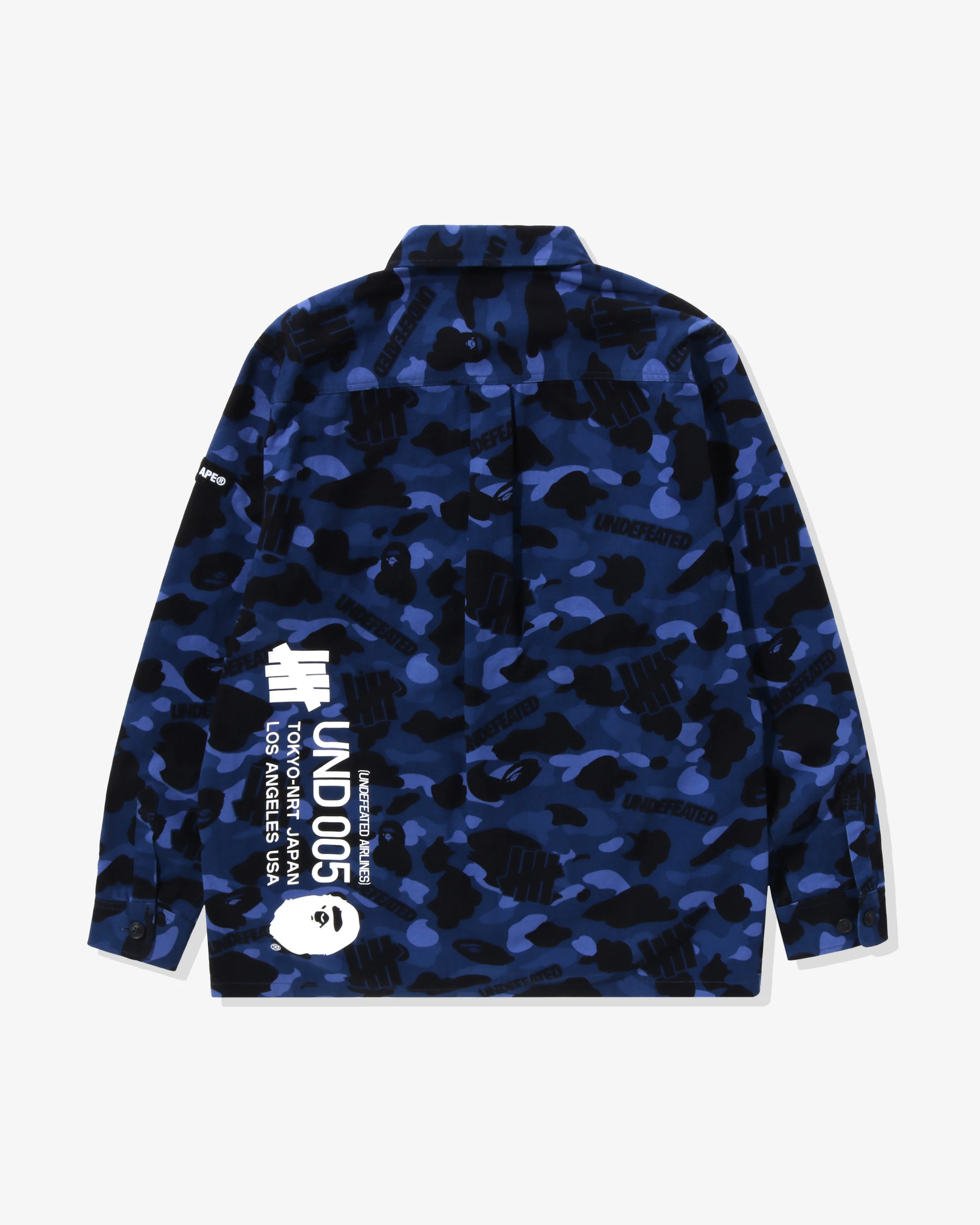 2929-bape-x-undefeated-color-camo-flannel-jacket-navy-2.webp BAPE X UNDEFEATED COLOR CAMO FLANNEL JACKET - NAVY