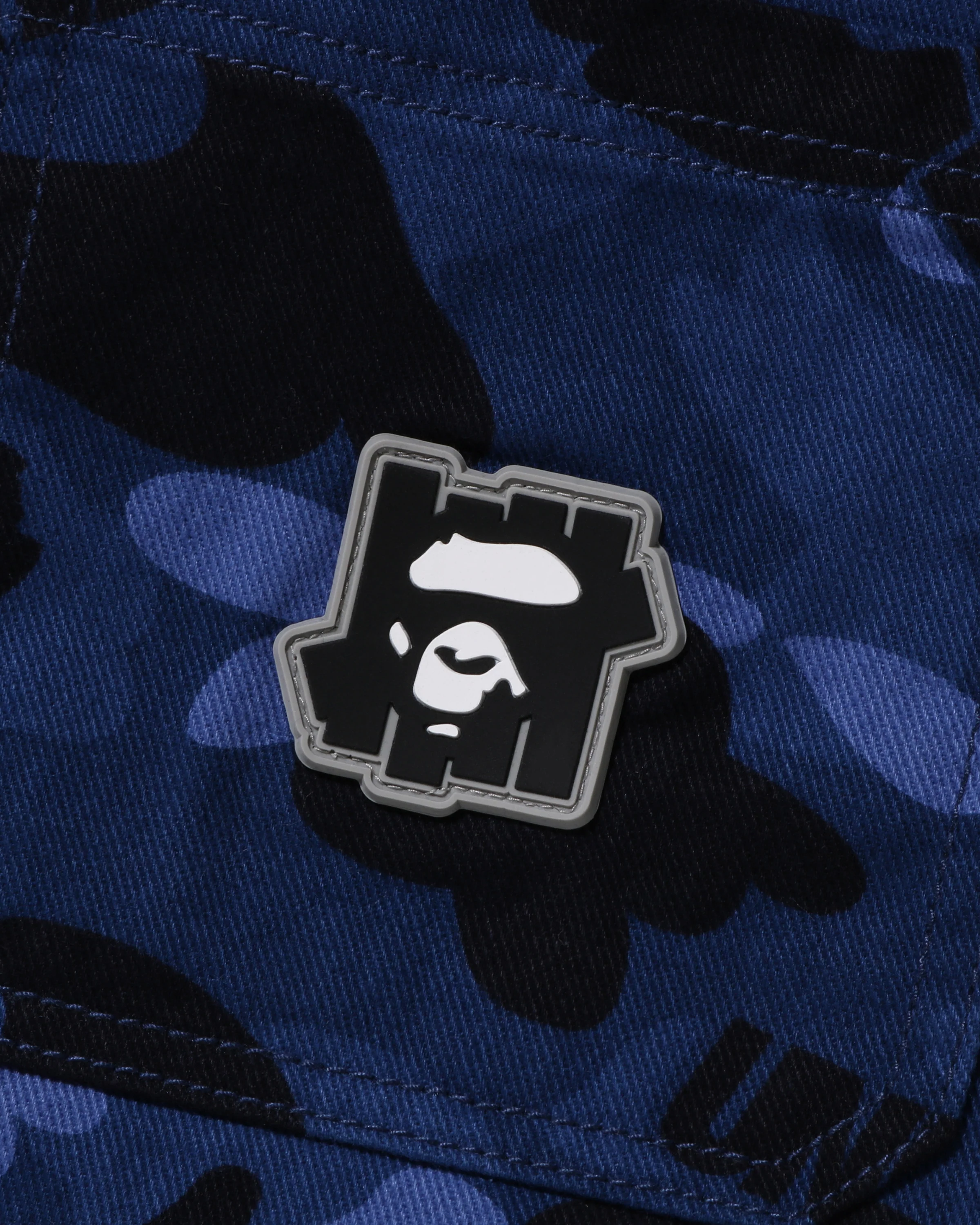 2929-bape-x-undefeated-color-camo-flannel-jacket-navy-3.webp BAPE X UNDEFEATED COLOR CAMO FLANNEL JACKET - NAVY