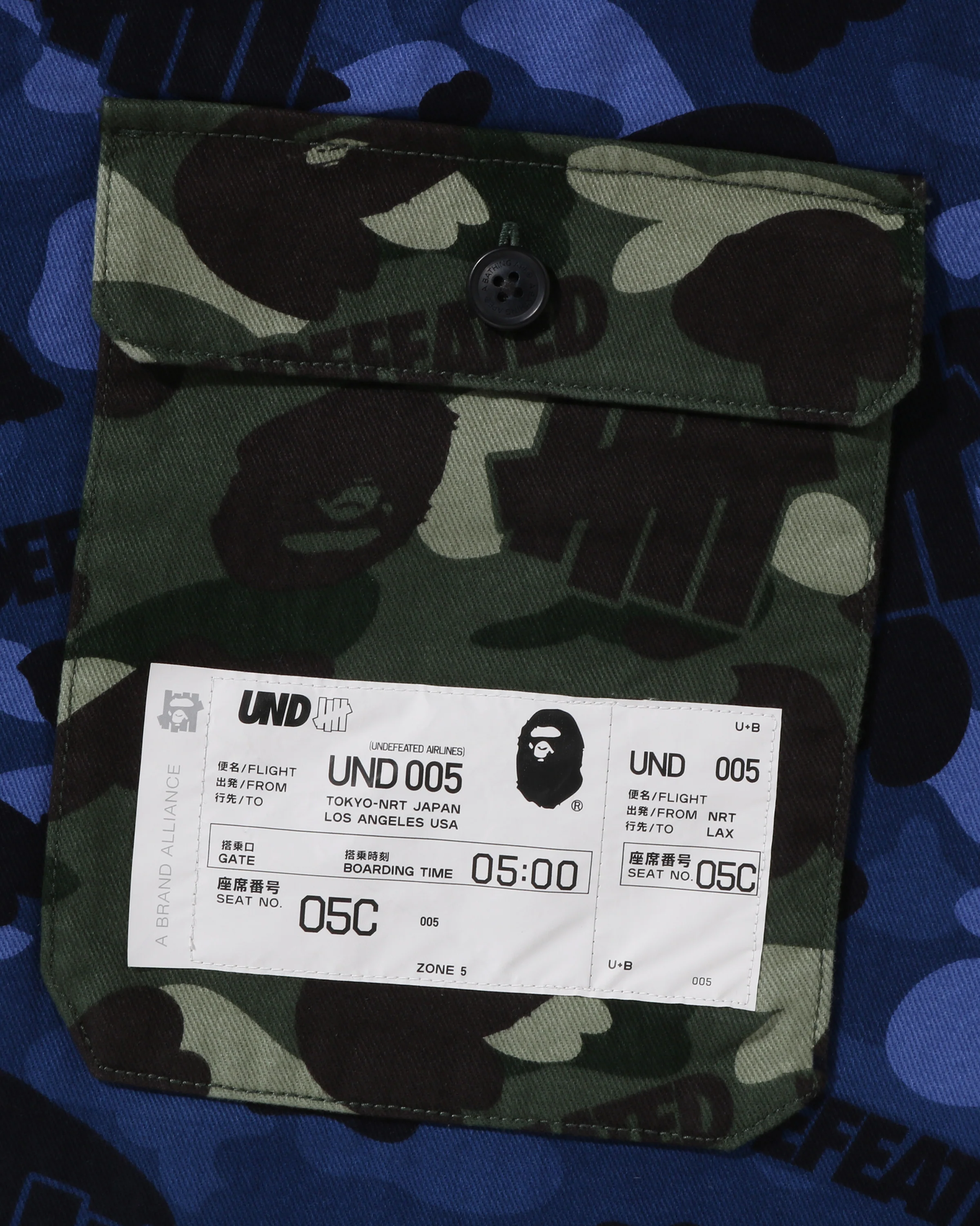 2929-bape-x-undefeated-color-camo-flannel-jacket-navy-4.webp BAPE X UNDEFEATED COLOR CAMO FLANNEL JACKET - NAVY