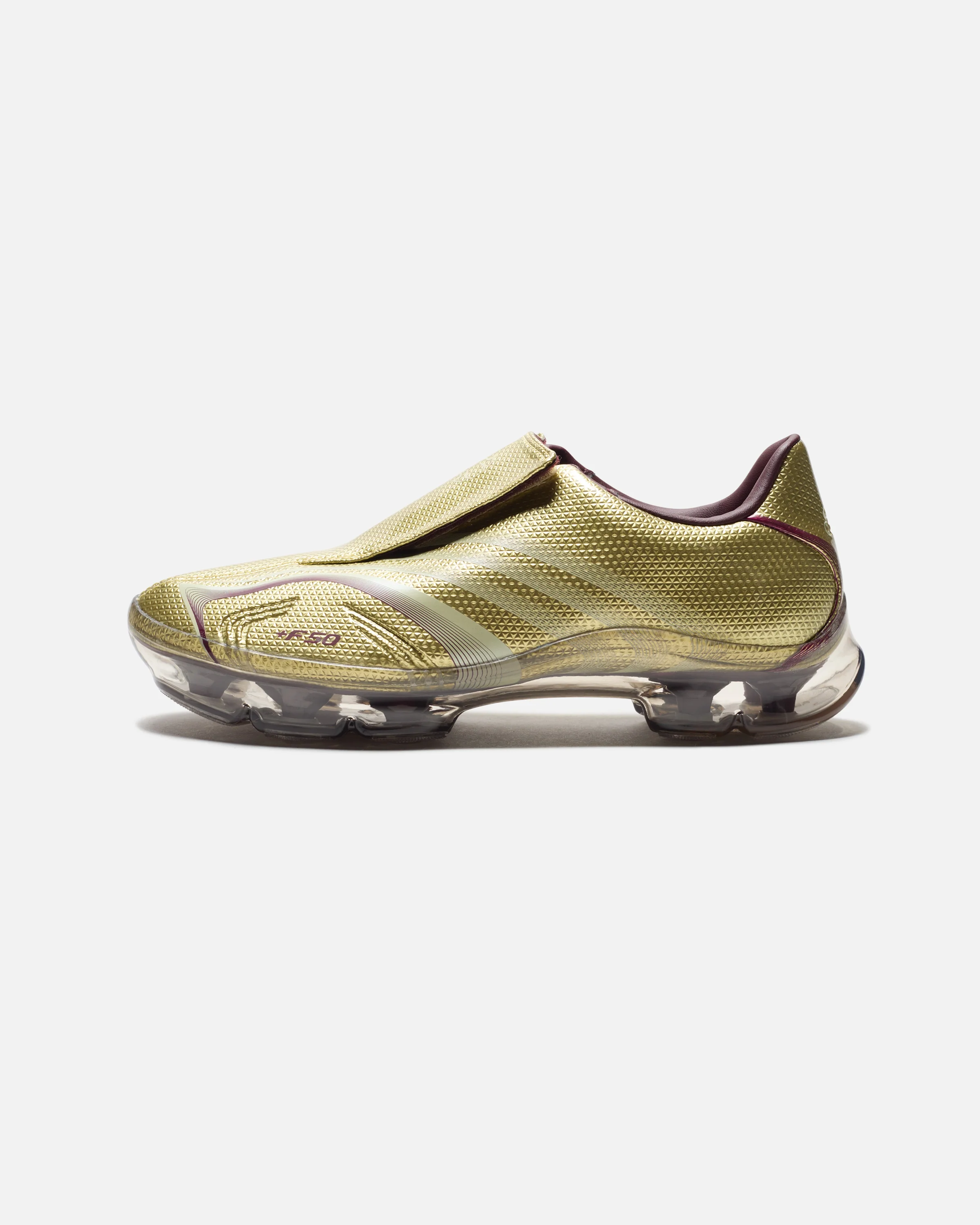 3411-adidas-wmns-f50-adiframe-goldmt-icgome-maroon-2.webp ADIDAS WMNS F50 ADIFRAME - GOLDMT/ ICGOME/ MAROON