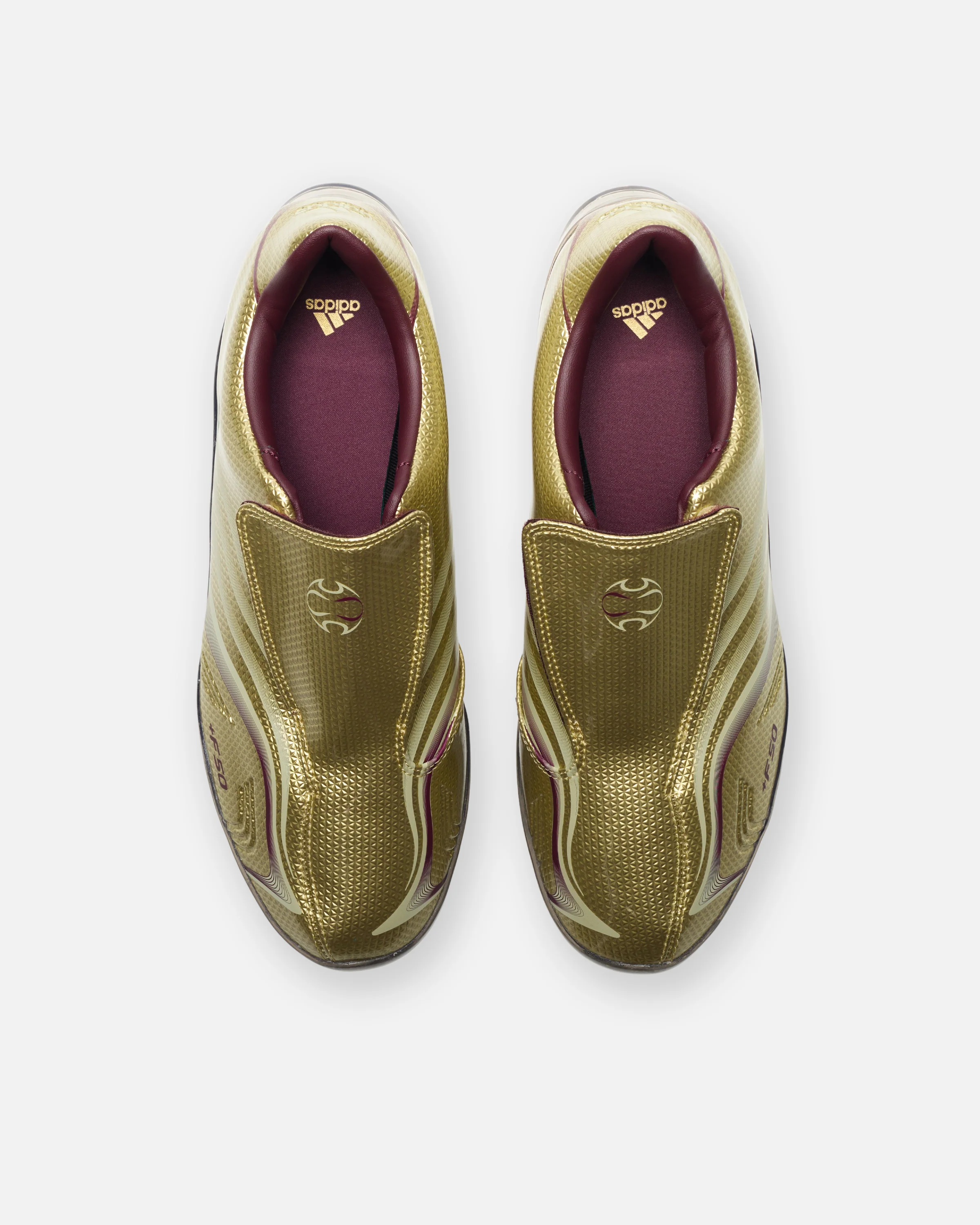 3411-adidas-wmns-f50-adiframe-goldmt-icgome-maroon-4.webp ADIDAS WMNS F50 ADIFRAME - GOLDMT/ ICGOME/ MAROON