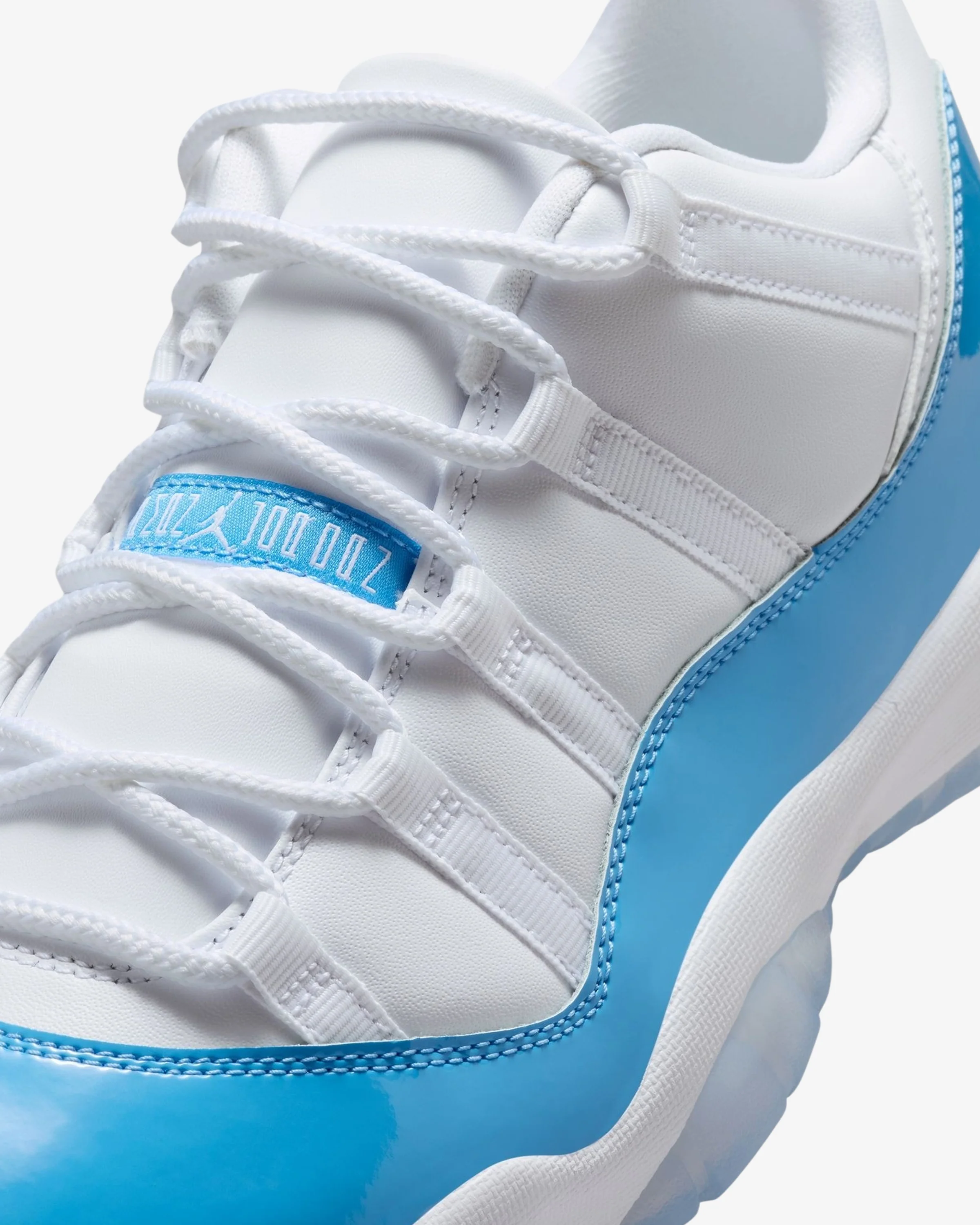 JORDAN AJ 11 RETRO LOW - WHITE/ UNIVERSITY BLUE/ BLACK